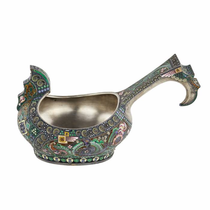 A graceful silver kovsh in the Russian Art Nouveau style of the 11th Moscow artel. Early 20th century.