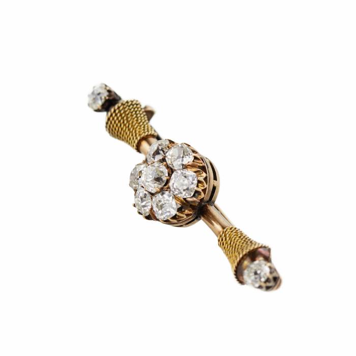 Elegant Russian gold brooch of 56 samples with diamonds. St. Petersburg 1908-1917 