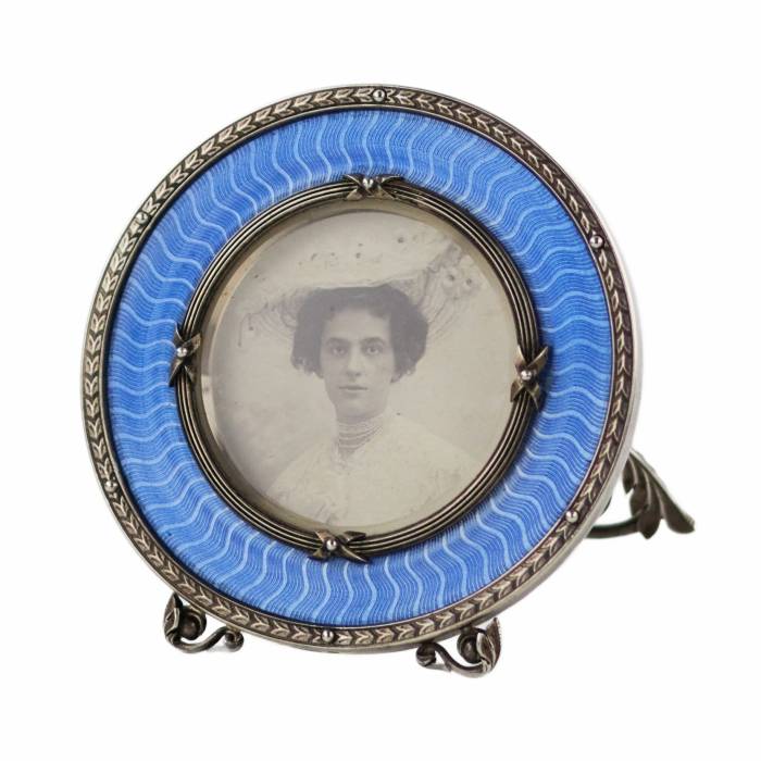 Silver photo frame with guilloché enamel. Saint Petersburg. I.S. Britsyn. 1908-1917.