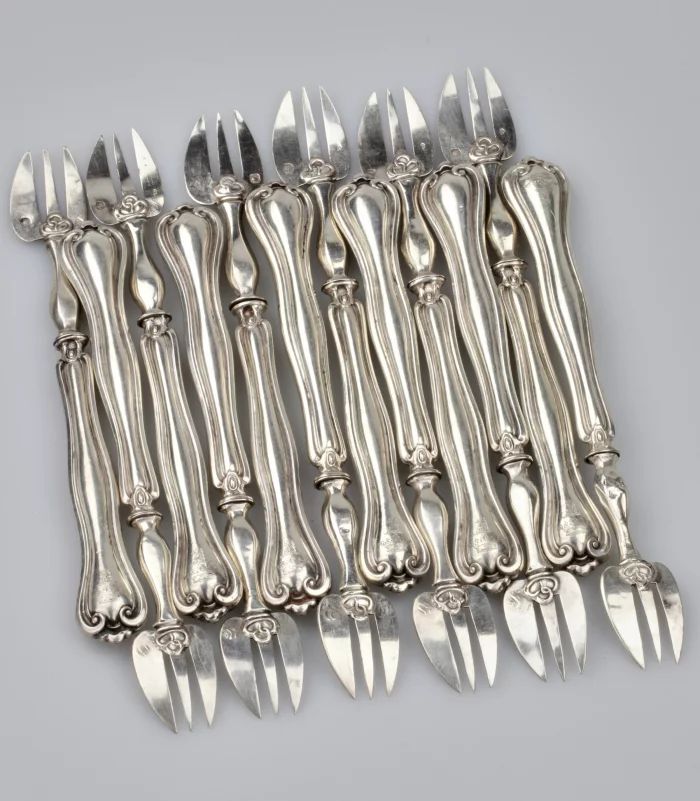 Комплект серебряных вилочек для устриц 