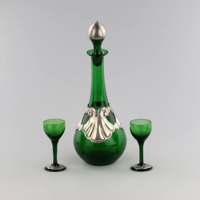 Decanter with two glasses. A tete-a-tete set.
