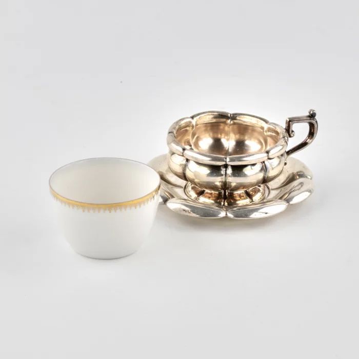 Porcelain coffee set in silver. 1920s 