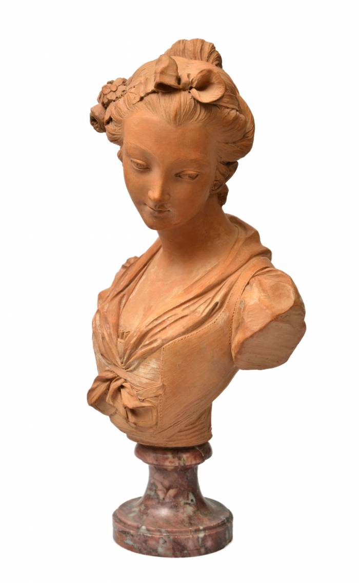 Terracotta bust on a marble base Bust of a Virgin