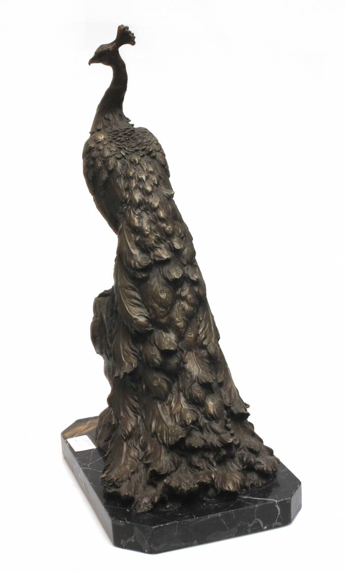 Bronze peacock on a granite base