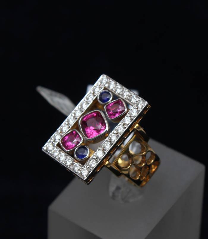 Gold ring with diamonds, rubies, sapphire