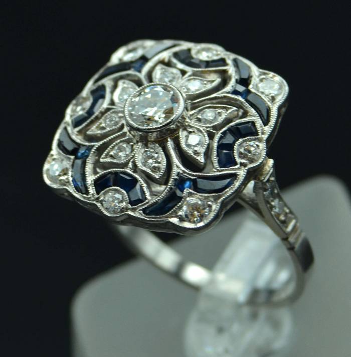 Platinum art-deco style ring with diamonds and sapphires