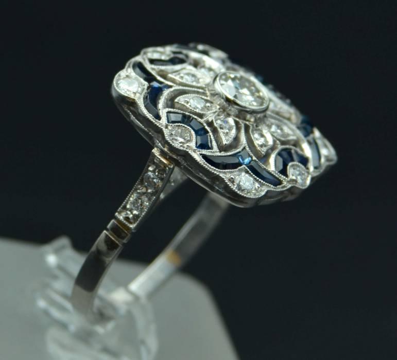 Platinum art-deco style ring with diamonds and sapphires