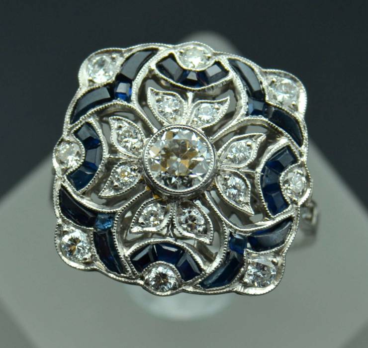 Platinum art-deco style ring with diamonds and sapphires