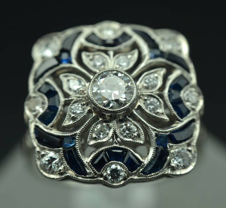 Platinum art-deco style ring with diamonds and sapphires