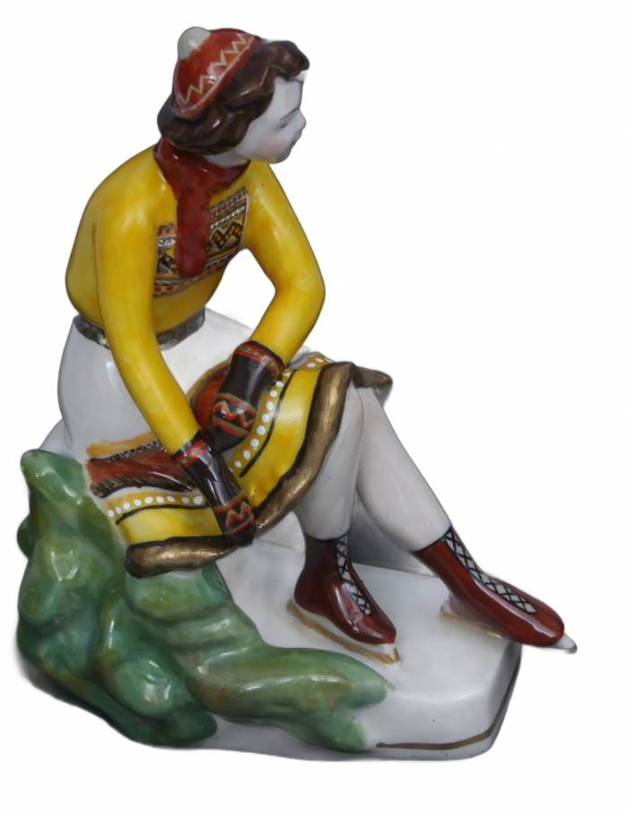 Porcelain figurine ``Girl with skates``