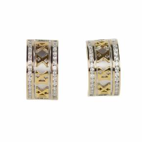 Ribbon, semicircular, two-tone gold earrings, 750 assay value, with diamonds. 13.28 gr. 