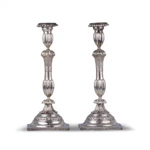 A pair of slender silver candlesticks. Russia 19th century. 