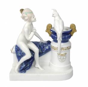 Figurine en porcelaine Fille nue avec un perroquet 