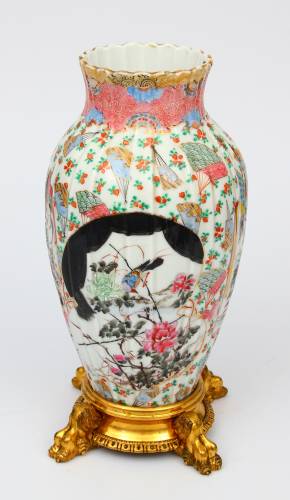 Porcelain vase on a bronze base