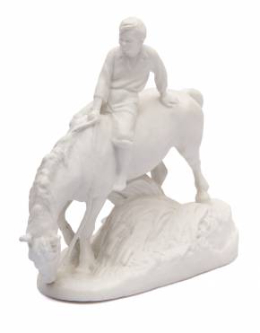 Figurine en biscuit Garçon sur un cheval 