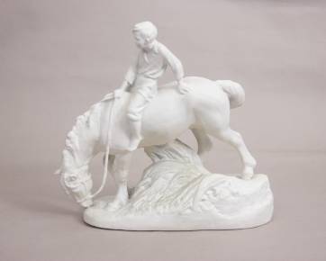 Biscuit figurine Boy on horse