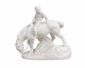 Figurine en biscuit Garçon à cheval 