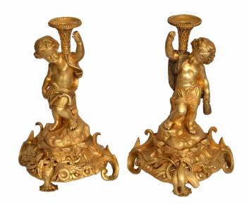 A pair of gilt bronze candlesticks